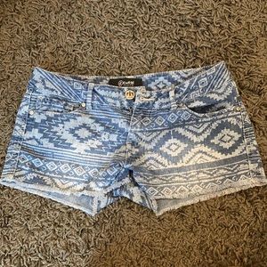 Tribal print denim shorts